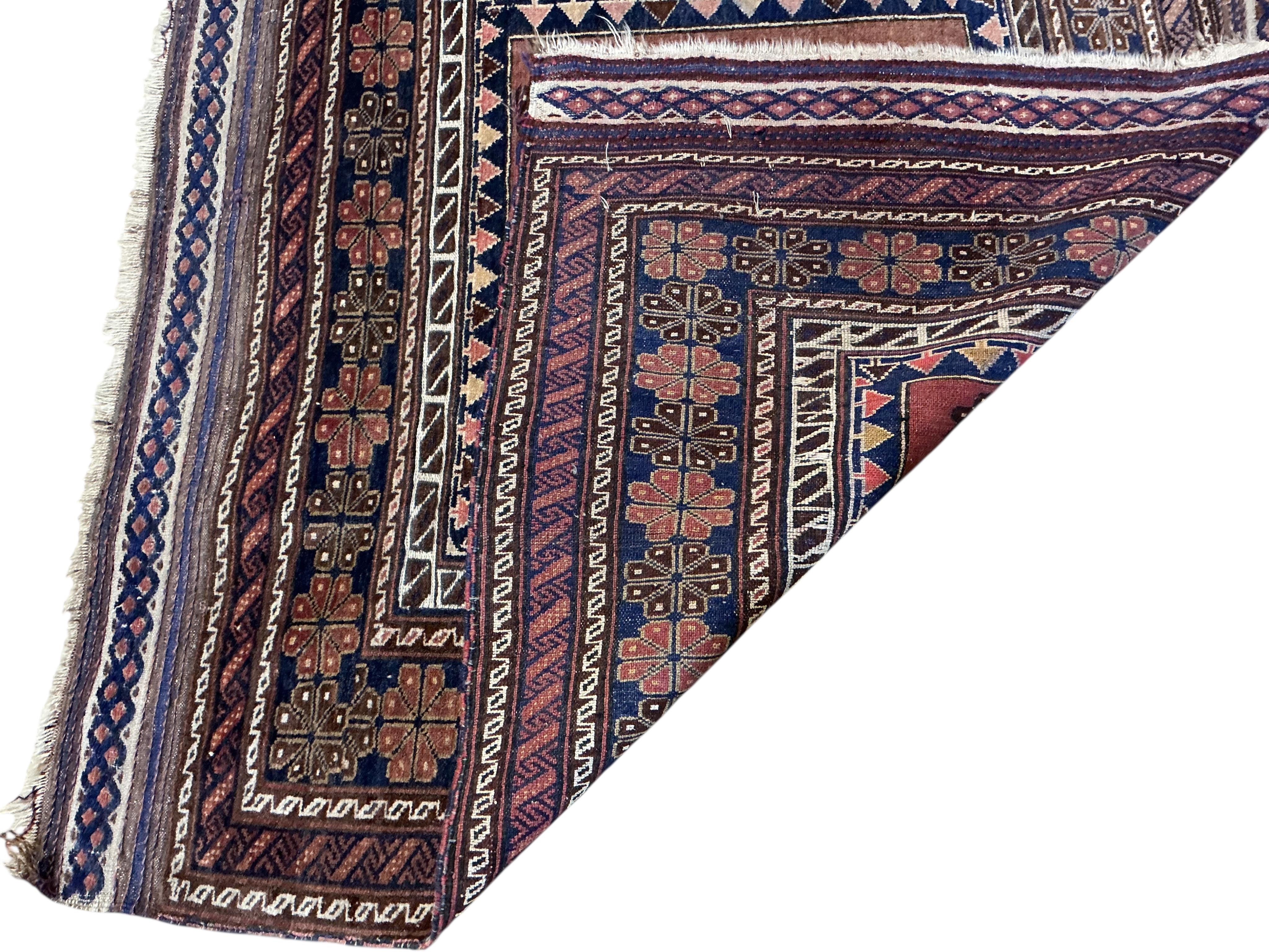 An Afghan red ground rug, a Kilim rug and a Caucasian rug, largest approx. 200 x 110cm